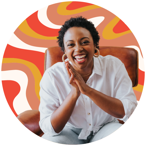 Jasmine Williams, founder of The Reach Club, smiling with a colorful red and orange background.